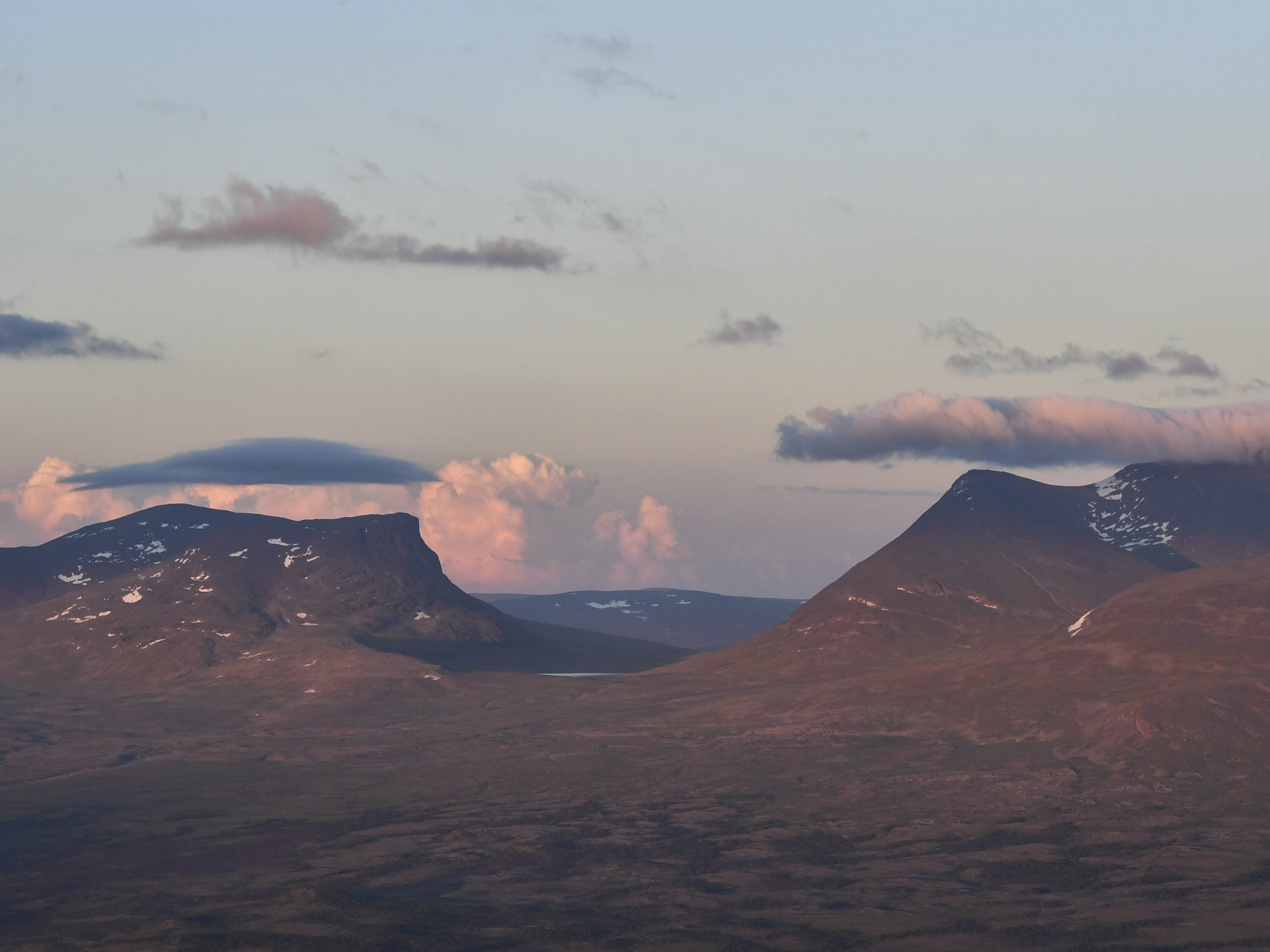 Mountain landscape at sunset.
