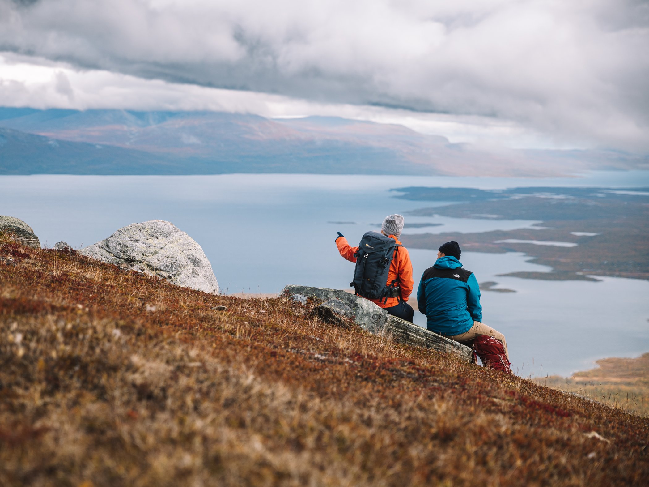 Hikers overlooking Lake Torneträsk.