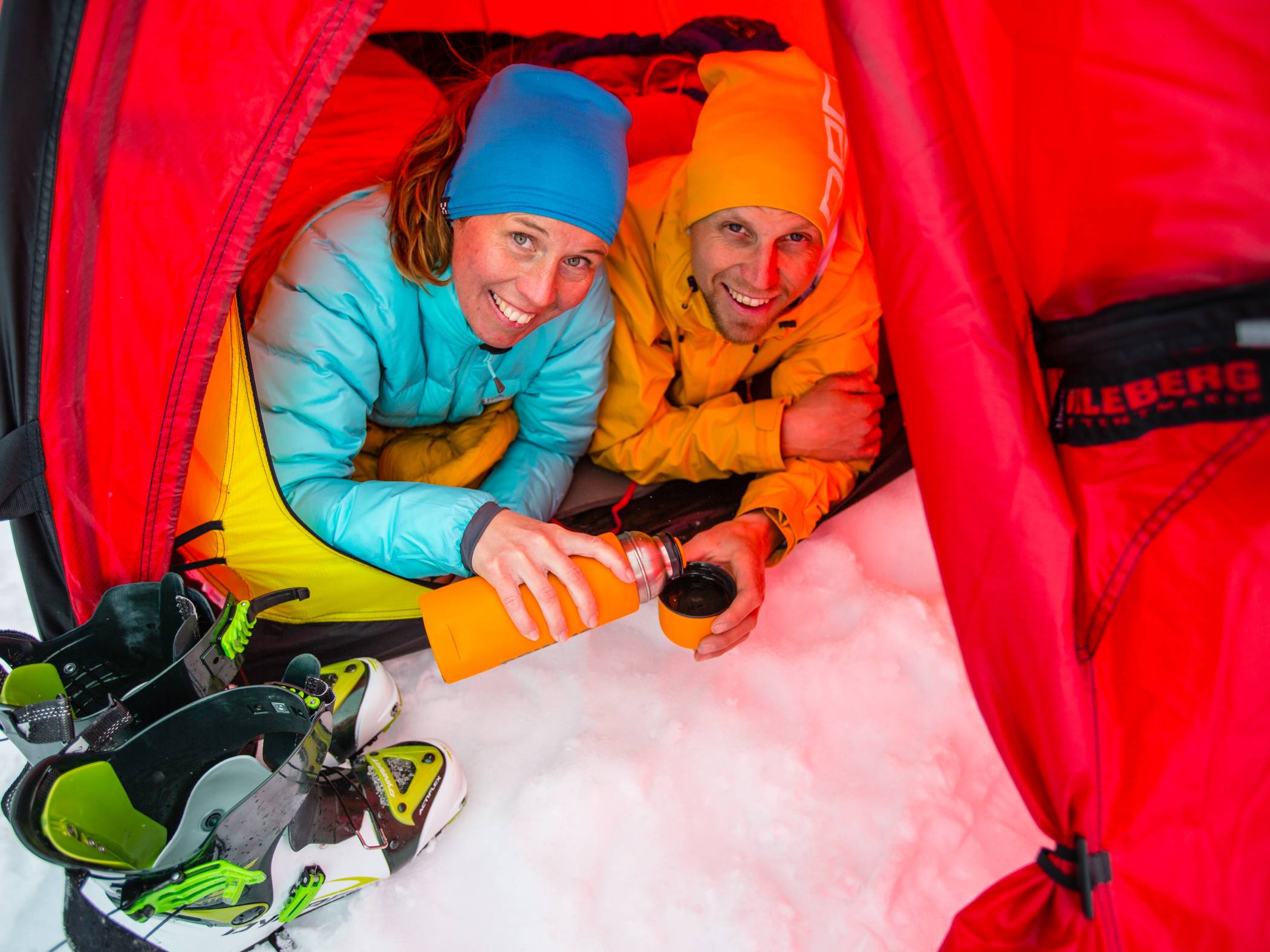 Two persons in a tent during winter at Kebnekaise.